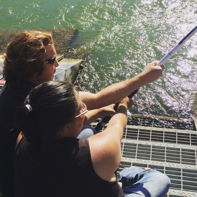 My wife Natalie and I working to land a White Sturgeon.
